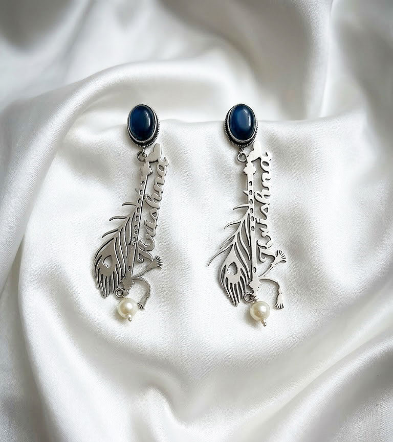 krishna flute & peacock feather oxidized drop earrings