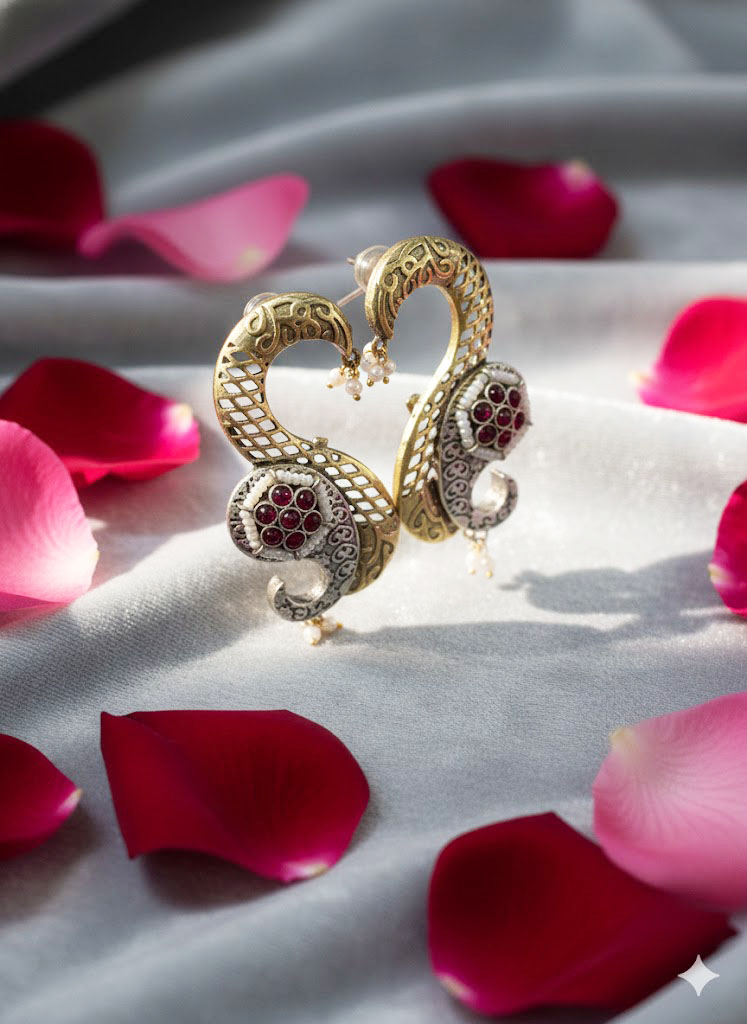 exquisite dual tone paisley motif statement earrings with ruby red stones and pearl accents exquisite dual tone paisley motif statement earrings with ruby red stones and pearl accents