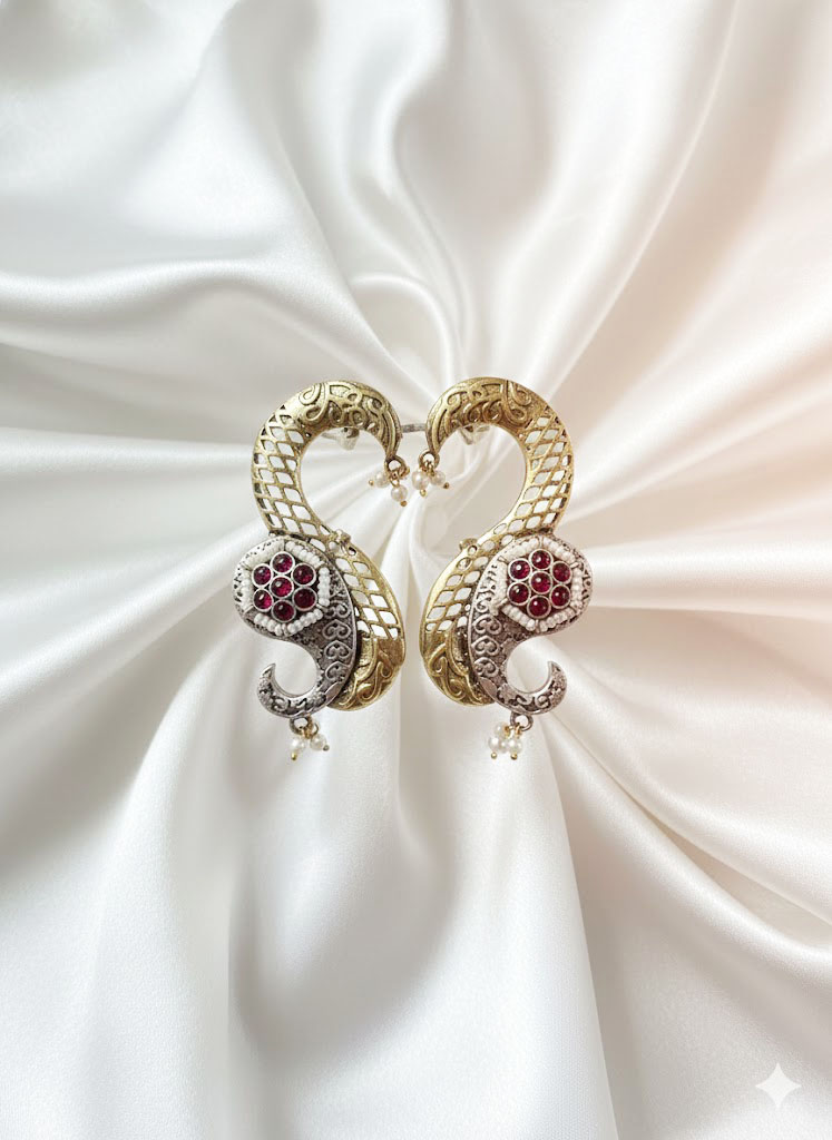 exquisite dual tone paisley motif statement earrings with ruby red stones and pearl accents exquisite dual tone paisley motif statement earrings with ruby red stones and pearl accents