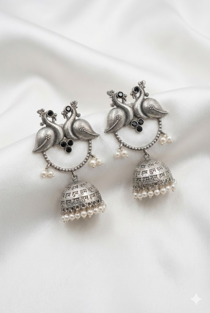 twin peacock oxidized silver jhumka earrings with pearl droplets twin peacock oxidized silver jhumka earrings with pearl droplets