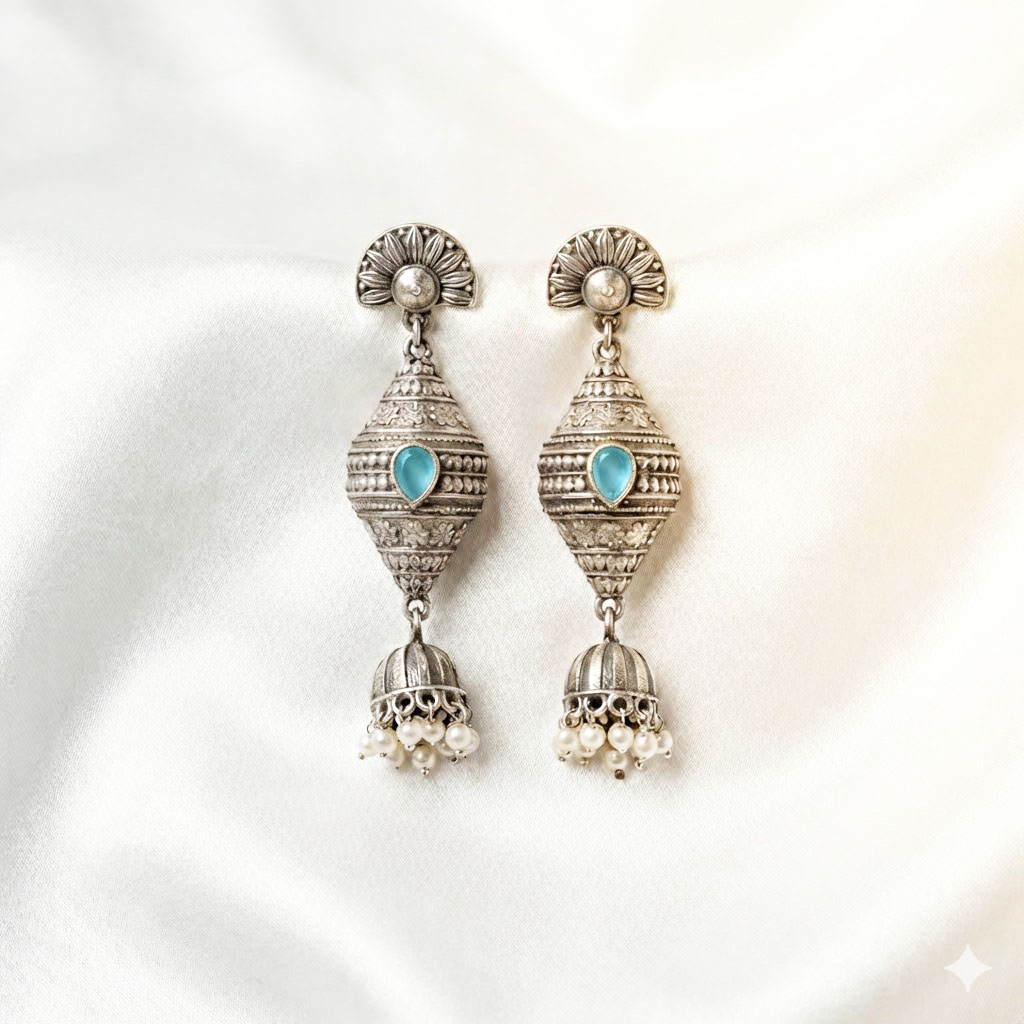 antique silver finished oxidized jhumka earrings with ruby accents