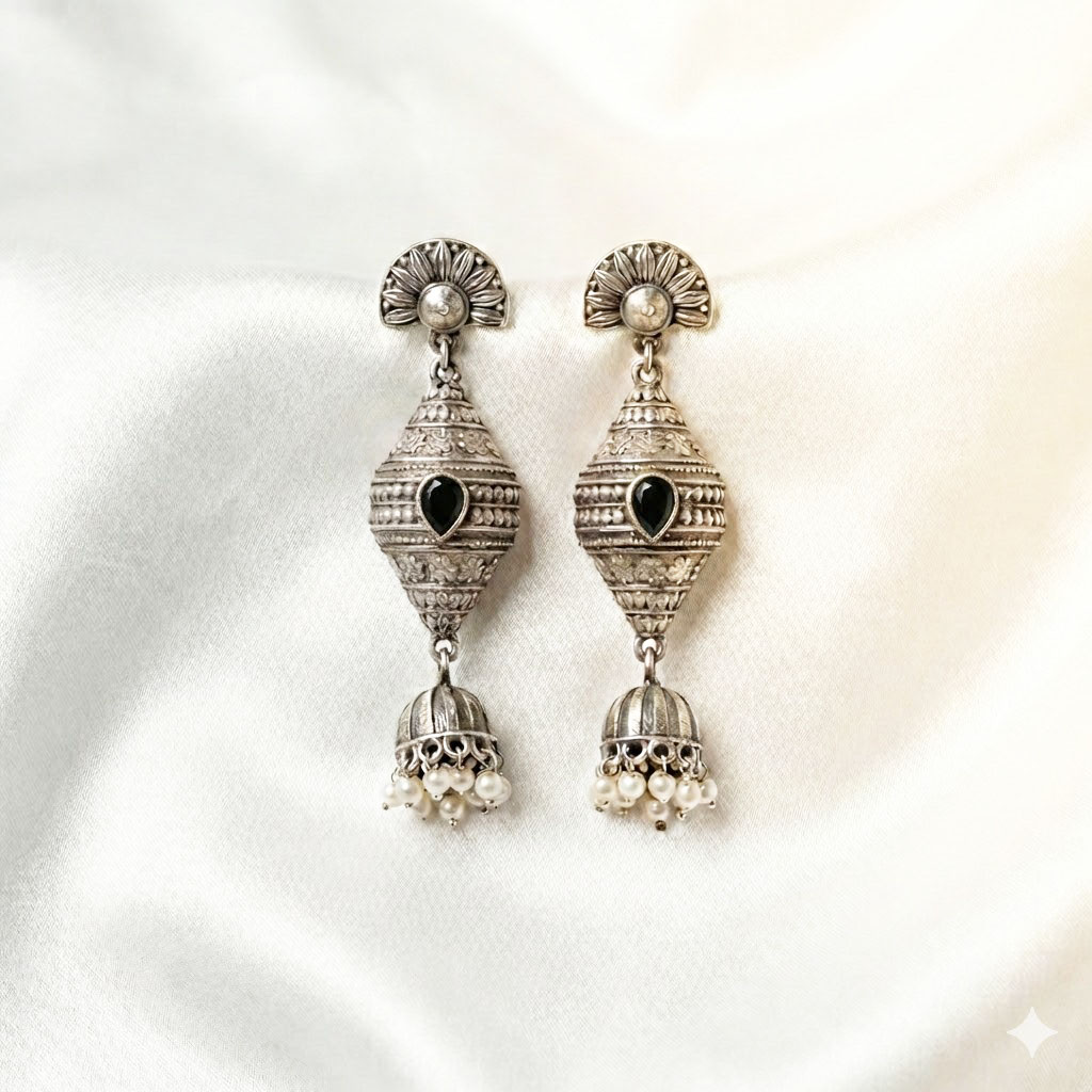 antique silver finished oxidized jhumka earrings with ruby accents