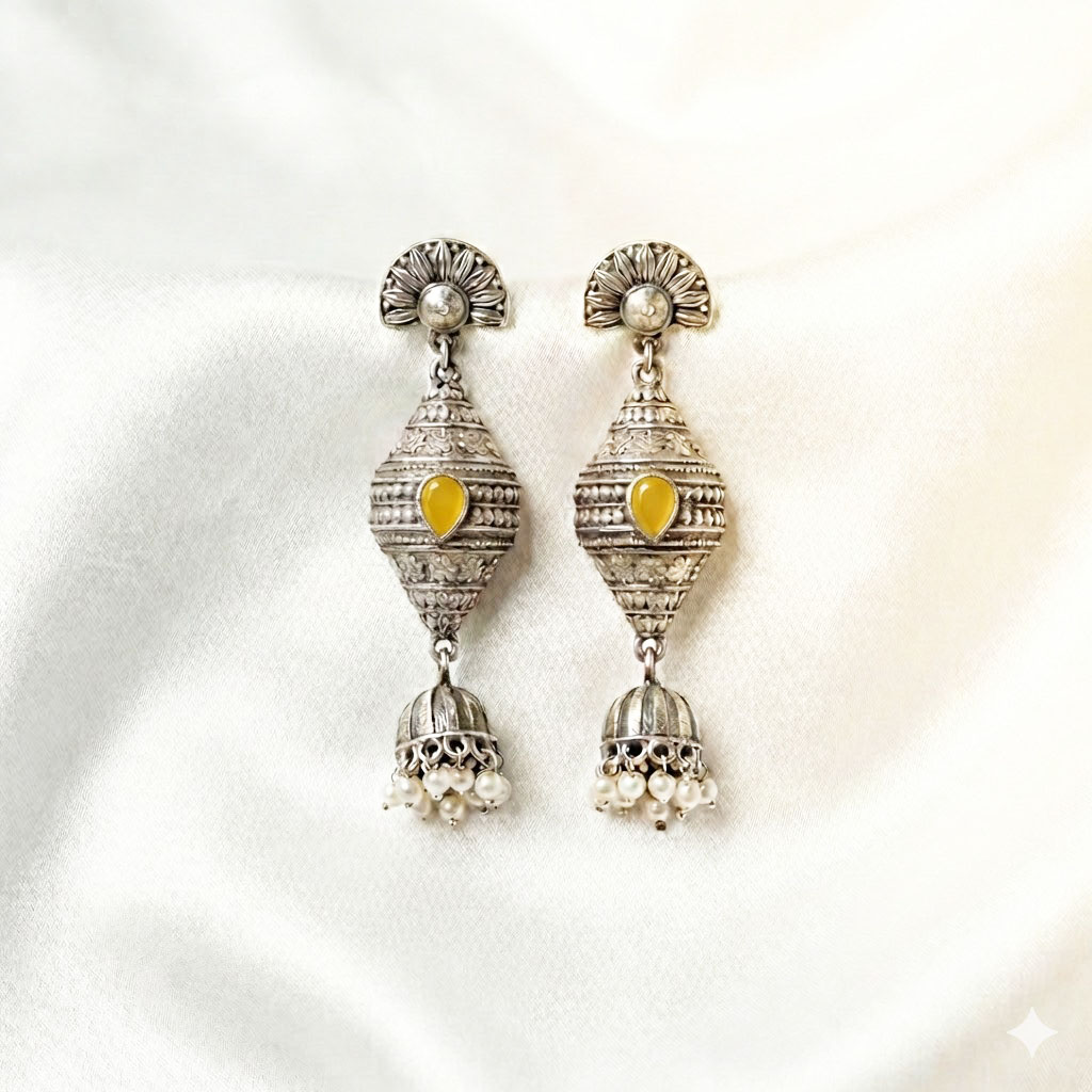 antique silver finished oxidized jhumka earrings with ruby accents
