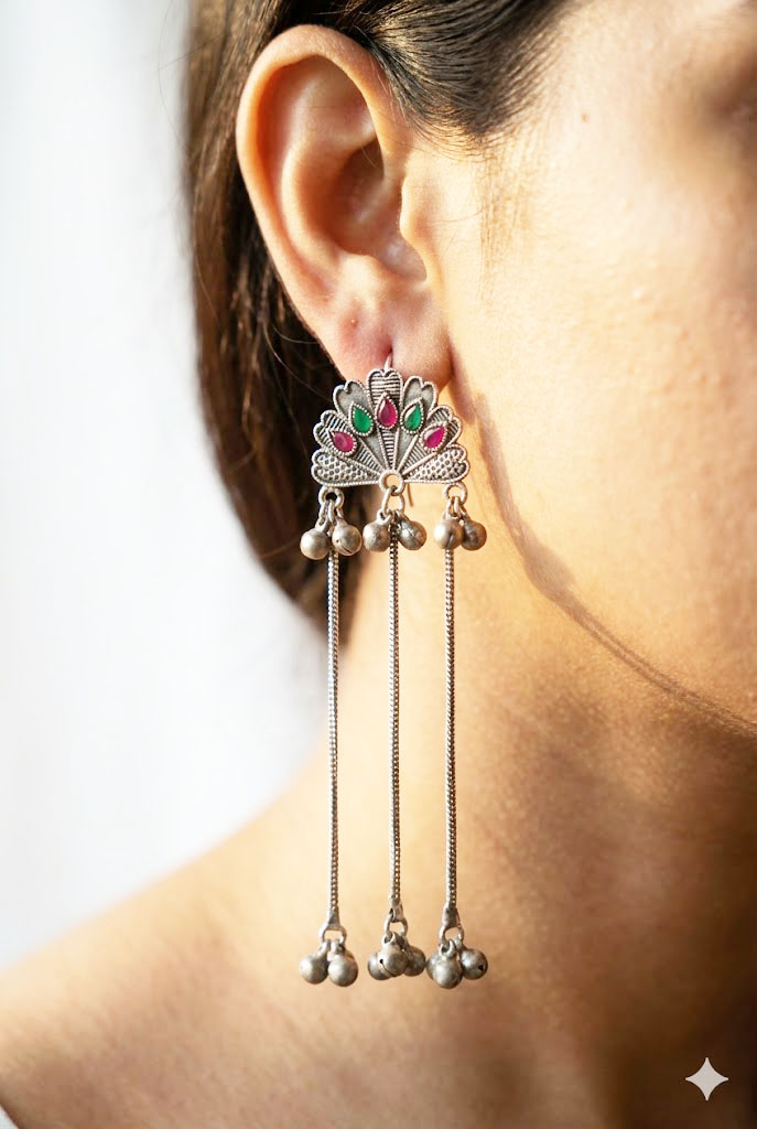 empress peacock oxidized long tassel earrings with ghungroo accents empress peacock oxidized long tassel earrings with ghungroo accents