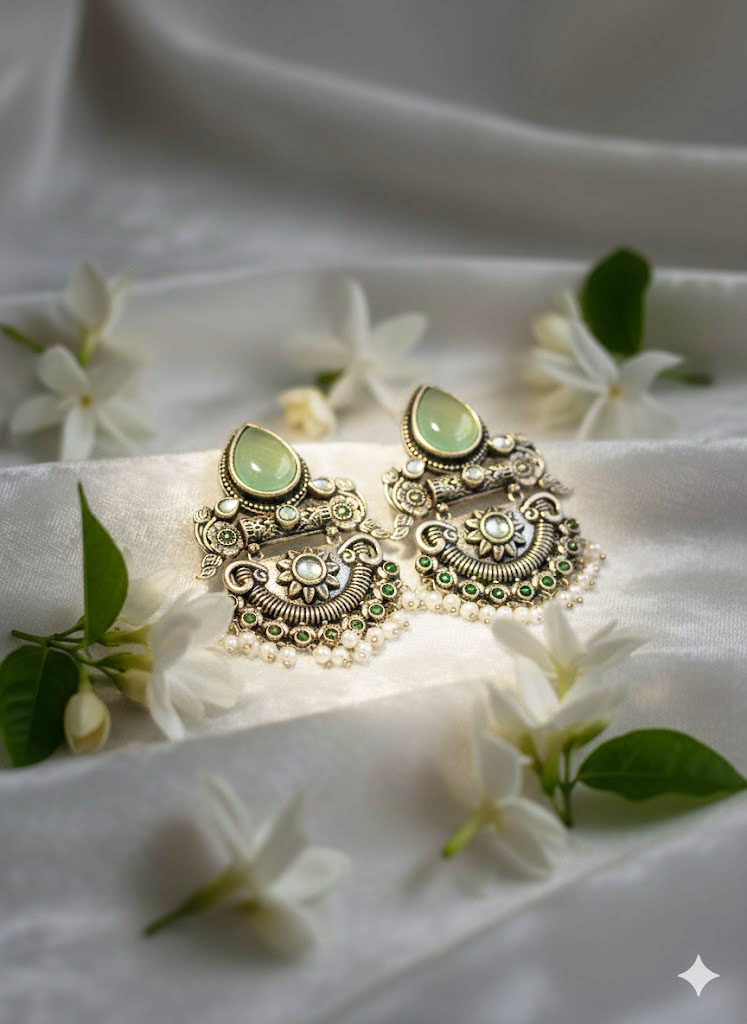 oxidized silver plated jhumka earrings with stones and pearl droplets oxidized silver plated jhumka earrings with stones and pearl droplets