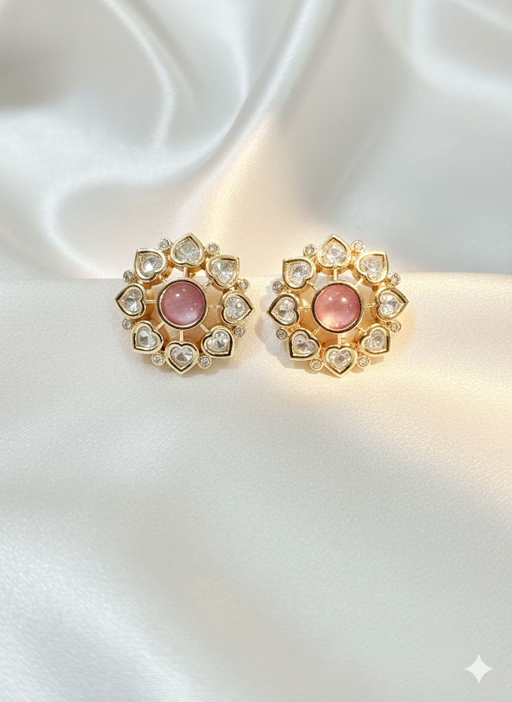 heart cut zircon floral stud heart cut zircon floral stud by Malini