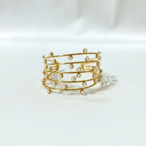 Bracelets golden multi strand pearl cuff bracelet by Malini
