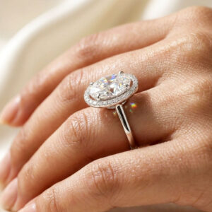 classic oval halo solitaire ring by Malini