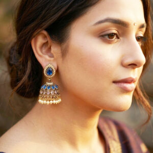 Home regal antique gold plated kundan and pearl jhumka earrings by Malini