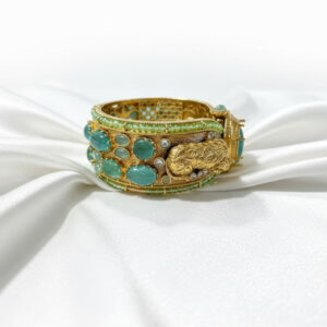 Home the sovereign turquoise & gold statement bangle by Malini