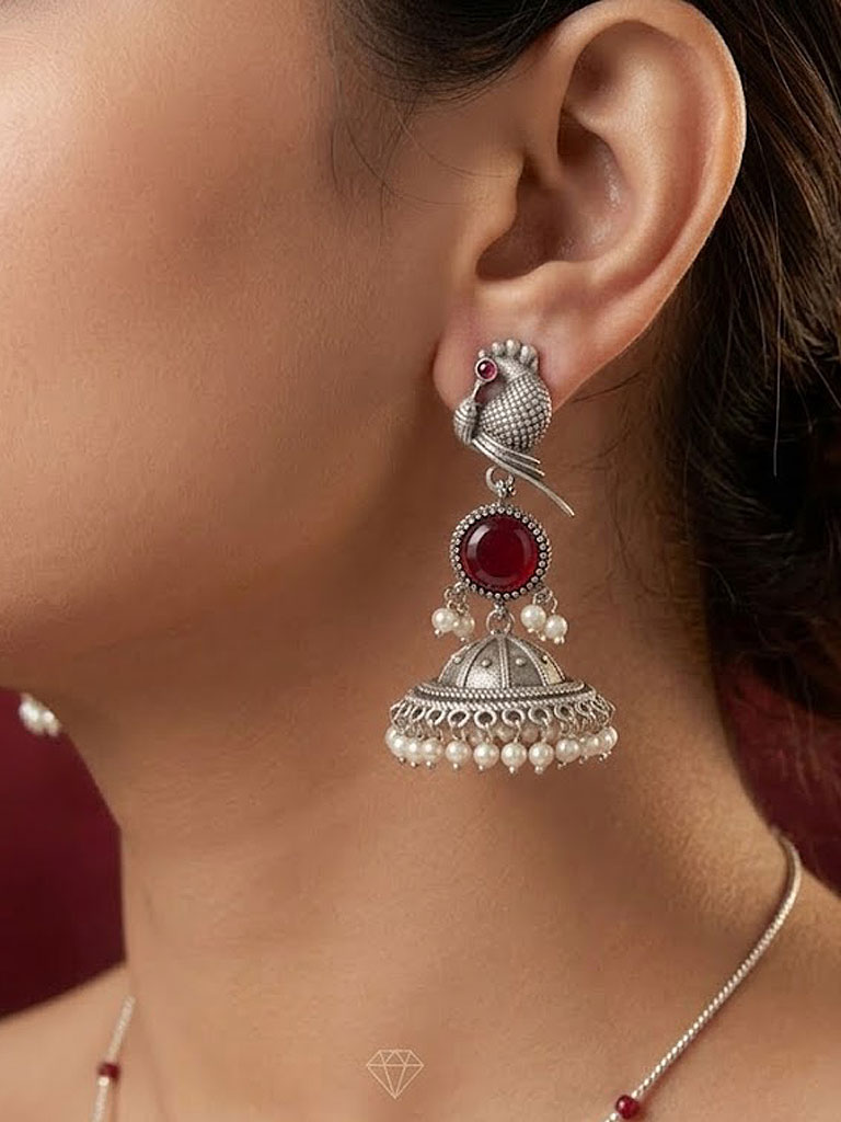 royal peacock motif oxidized jhumkas