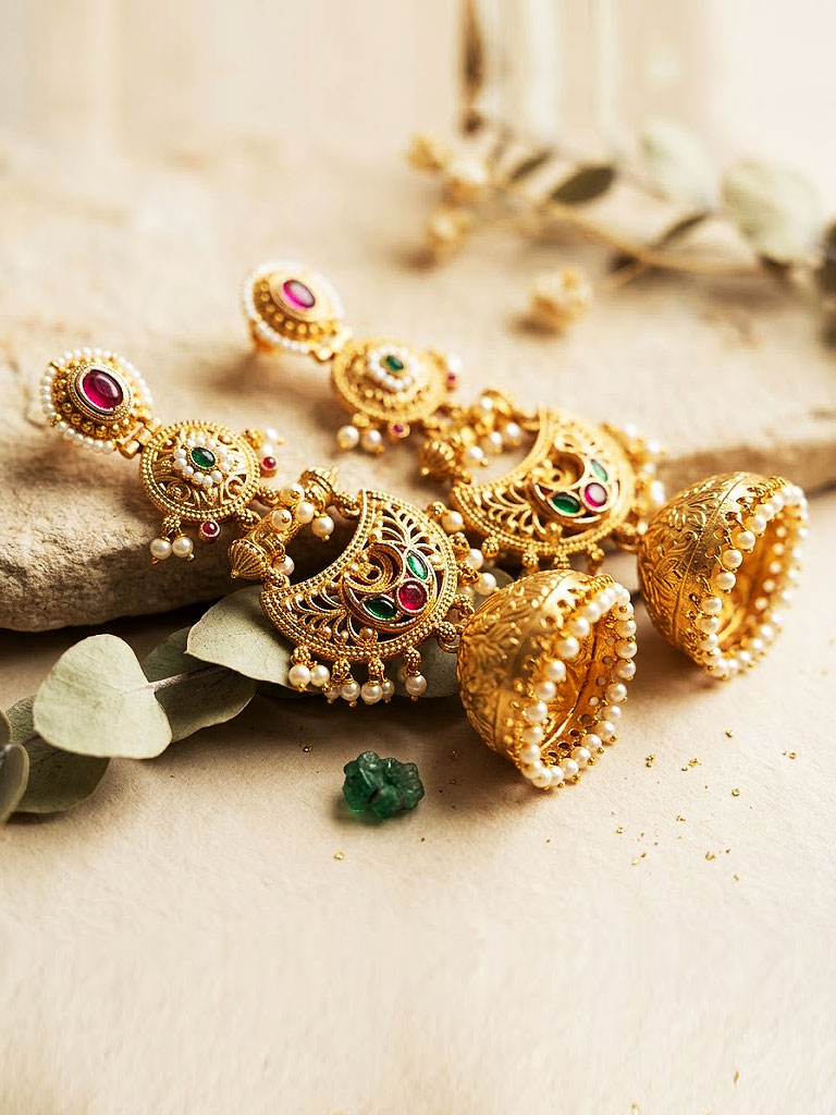 traditional multi tiered gold plated jhumka earrings